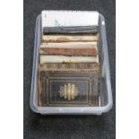 A box of three antique leather bound family bibles and a boxed World Publisher bible