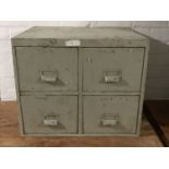 A mid 20th century metal four drawer filing chest