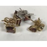 Three pairs of gold garnet earrings CONDITION REPORT: 2.