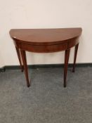 A 19th century inlaid mahogany demi-lune card table,