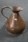 An antique copper jug