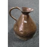 An antique copper jug