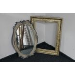 An antique gilt frame and a painted Edwardian mirror