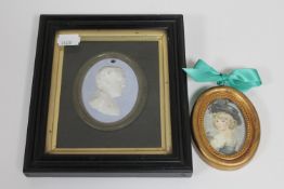 An early 20th century gilt framed relief portrait miniature of Frances Horner and a small print of