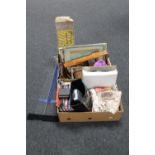 Two boxes of cookery books, table linen, serving tray,