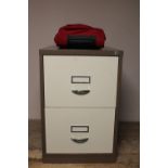 A two drawer metal filing cabinet together with a hold all