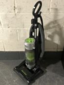 A Panasonic EkoMax upright vacuum