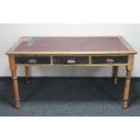 An early 20th century oak and pine writing desk