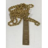 A 9ct gold ingot pendant on ropetwist chain CONDITION REPORT: 15.