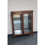 A double door mahogany display cabinet