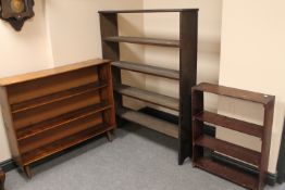 Three sets of open bookshelves