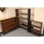 Three sets of open bookshelves