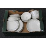 A box of twenty-four pieces of Denby Monsoon home dinner ware