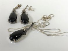 A silver and polished hard stone necklace and earring suite