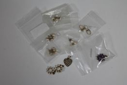 Five pairs of gold mounted pearl earrings,