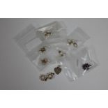 Five pairs of gold mounted pearl earrings,