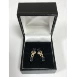 A pair of 9ct gold sapphire and diamond earrings with post fittings
