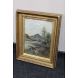 A gilt framed oil on canvas - river, signed M.E.W.