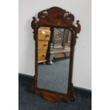 An antique Chippendale style wall mirror