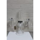 A cut glass two way table candelabra
