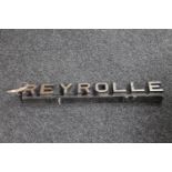 A cast iron Reyrolle metal sign