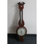 A Victorian inlaid mahogany banjo barometer by F Robson & Company of Newcastle upon Tyne