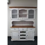 A painted pine kitchen dresser CONDITION REPORT: 186cm high by 140cm wide by 41cm