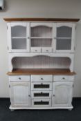 A painted pine kitchen dresser CONDITION REPORT: 186cm high by 140cm wide by 41cm