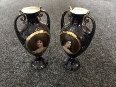 A pair of Austrian twin handled transfer printed vases (a/f)