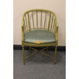 A 20th century faux bamboo armchair