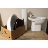 A sink and pedestal together with a bidet,