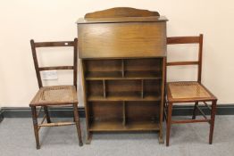 A lady's bureau and two antique bedroom chairs