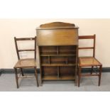 A lady's bureau and two antique bedroom chairs