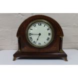An antique mahogany Swiss made mantel clock by Buren