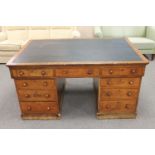 A Victorian mahogany twin pedestal partner's desk