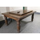 A heavily carved Victorian oak wind out dining table with two leaves CONDITION REPORT: