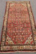 An antique Iranian Hamadan rug,