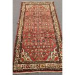 An antique Iranian Hamadan rug,