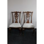 A pair of dining chairs