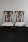 A pair of dining chairs