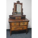 A Victorian mahogany and walnut dressing chest