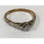 An 18ct gold solitaire diamond ring, size M1/2 CONDITION REPORT: 2.