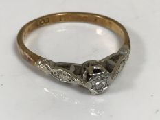 An 18ct gold solitaire diamond ring, size M1/2 CONDITION REPORT: 2.