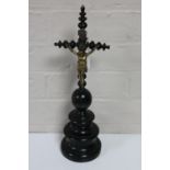 An ebony table crucifix