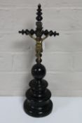 An ebony table crucifix