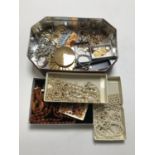 A tin of costume jewellery, 9ct gold earrings, cameo brooch,