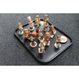 A tray of thirteen West German Hummel figures (a/f),