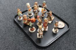 A tray of thirteen West German Hummel figures (a/f),