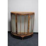 A 1930's walnut cocktail display cabinet (no shelves)