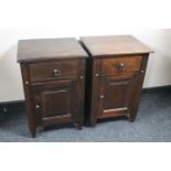 A pair of mahogany bedside cabinets fitted a drawer